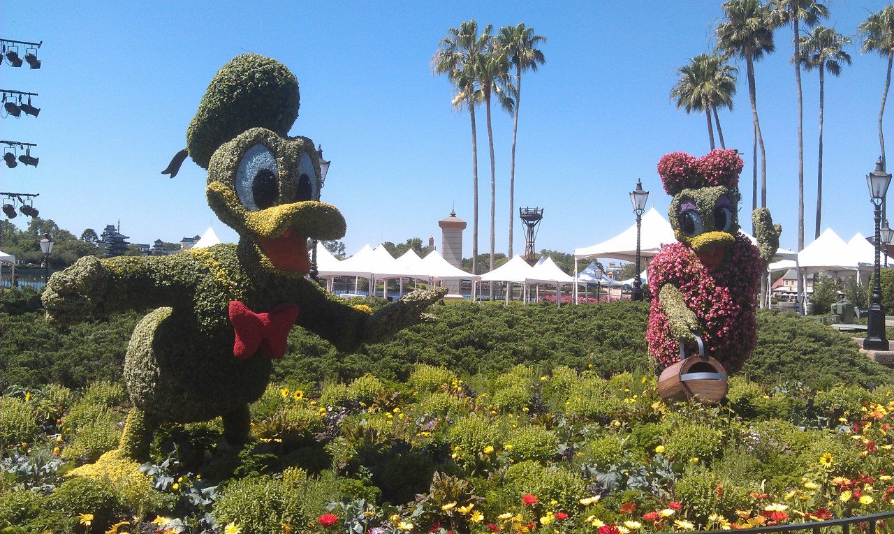 Donald and Daisy as you enter World Showcase.