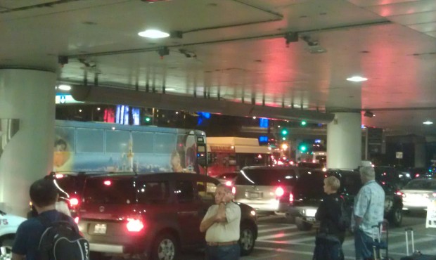 Welcome back to Los Angeles.. grid lock at LAX... but did spot a Disneyland bus.