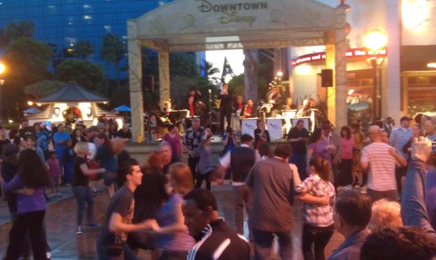 A fair number of guests out swing dancing in Downtown Disney.