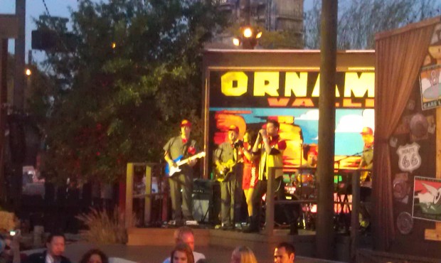 A band entertaining us while we wait for the #CarsLand opening
