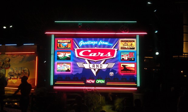 A sign proclaiming #CarsLand open
