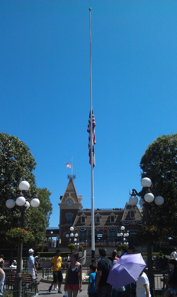 Disneyland flags are at half staff today to honor the victims of the shootings in Colorado.
