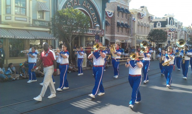 The All American College Band leading a march down Main Street before the nightly flag retreat.