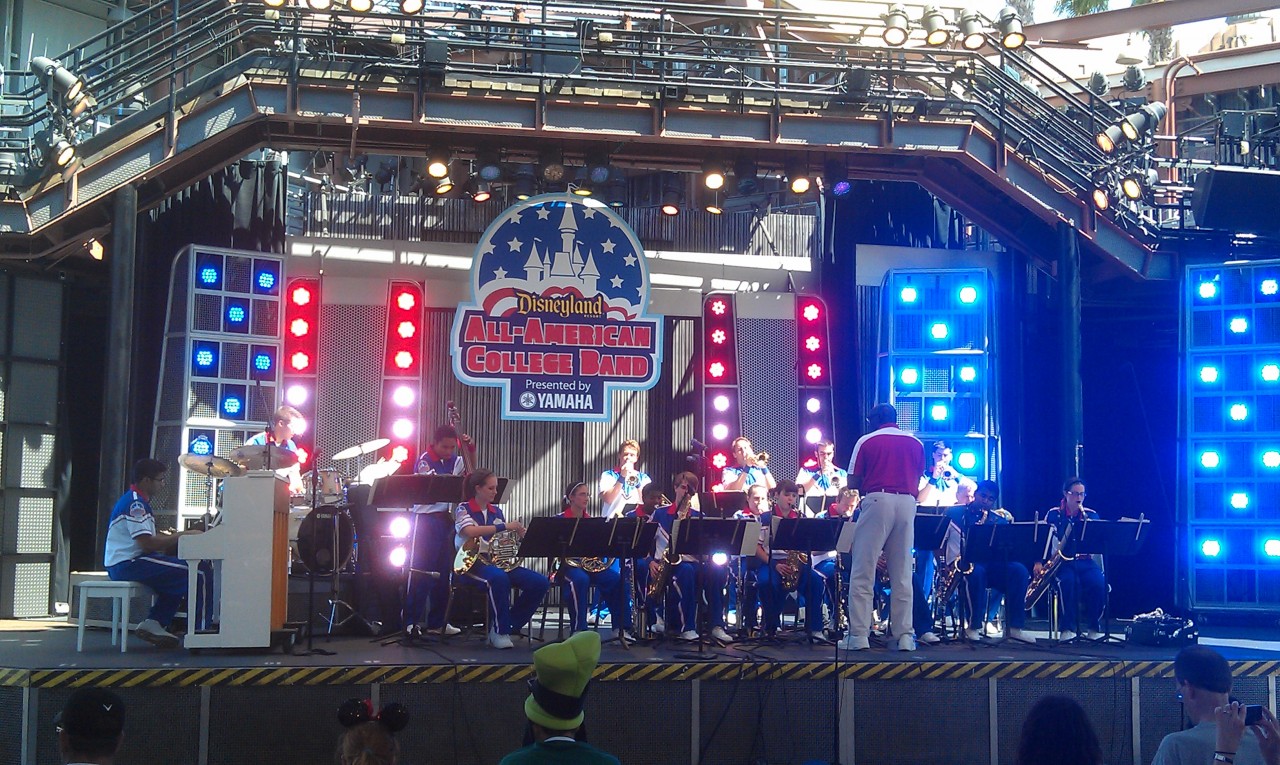 The All American College Band performs a set on the Hollywood Land Backlot stage at 325pm