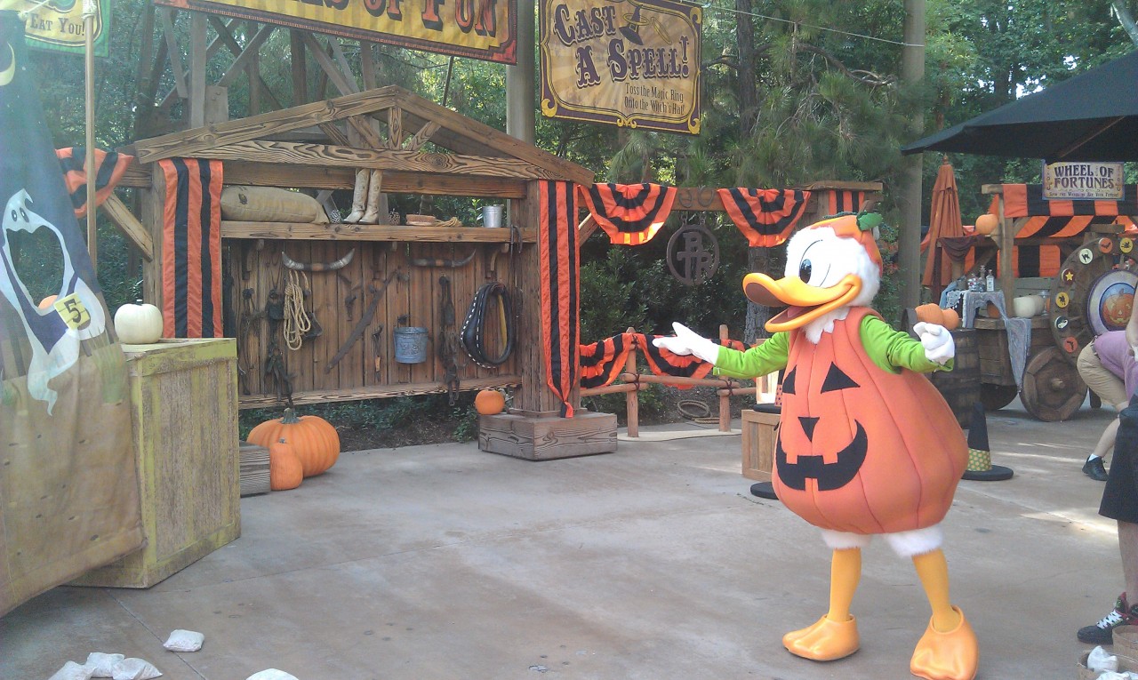 Donald trying the Hungry Ghouls game in the Halloween Carnival