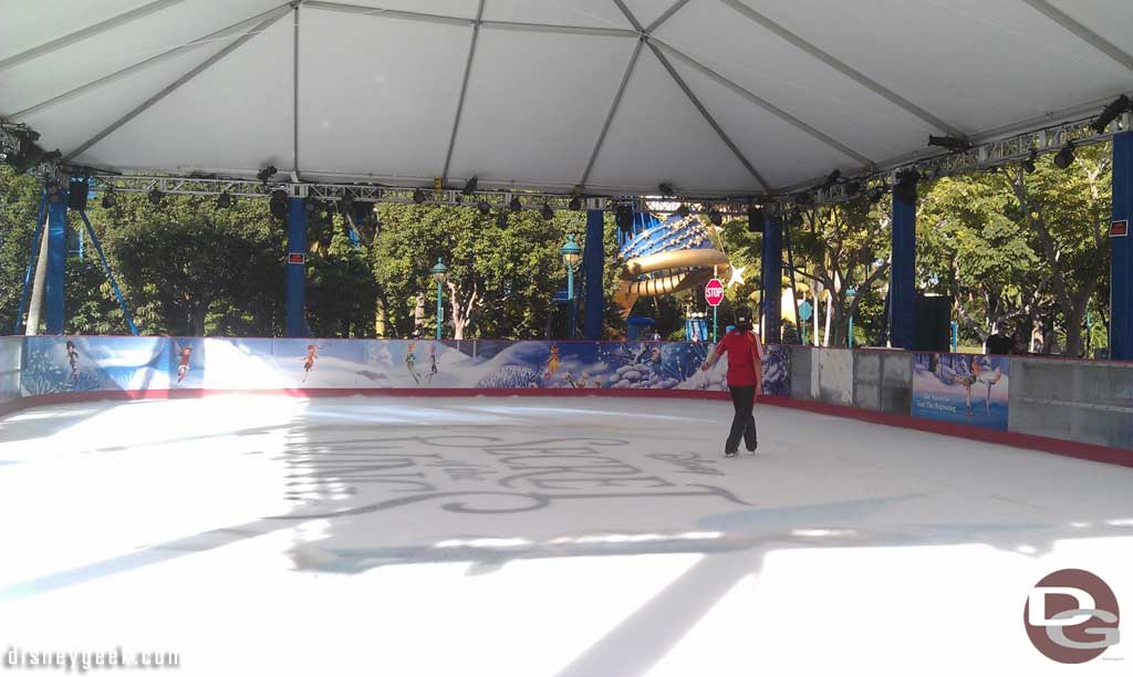 A couple cast members skating on the new ice rink in Downtown Disney