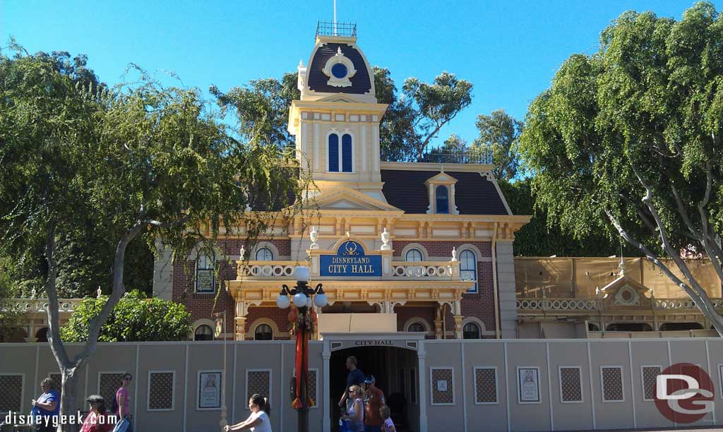 City Hall is out from behind the scaffolding but not the walls yet.