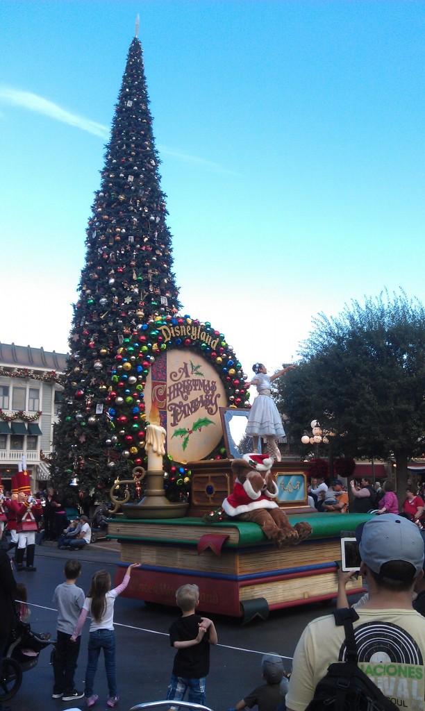 A Christmas Famtasy Parade arriving in town square.