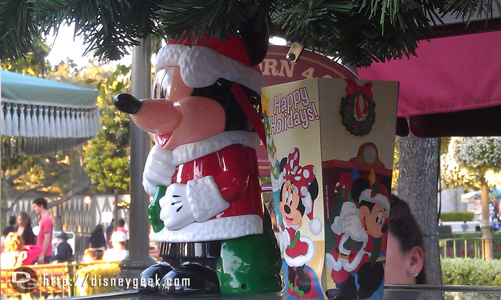 Santa Mickey popcorn buckets on Main Street USA