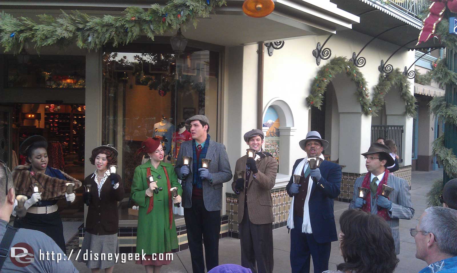 The Buena Vista Street Community Bell Ringers performing in front of the Los Feliz Five Dime
