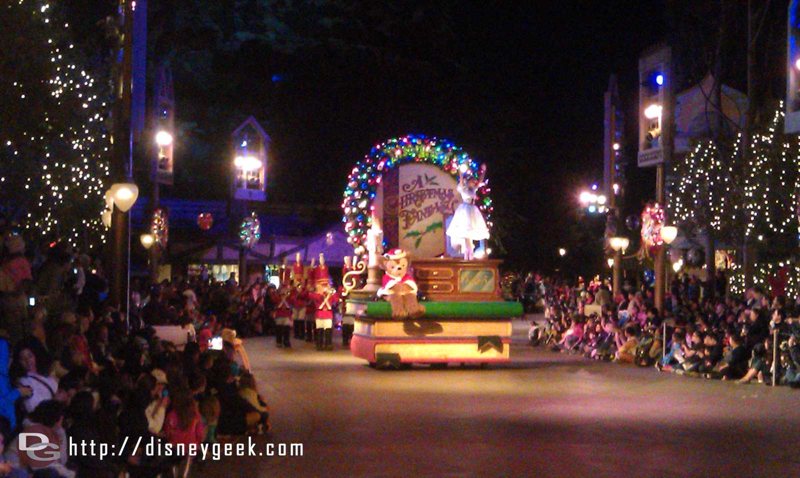 The first Christmas Fantasy parade of the year making its way toward Small World