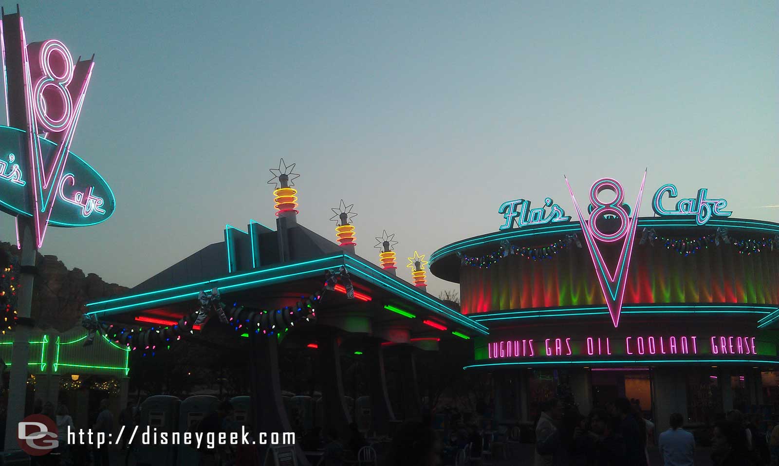 A favorite time of day in CarsLand the lights coming on while Winter Wonderland plays.