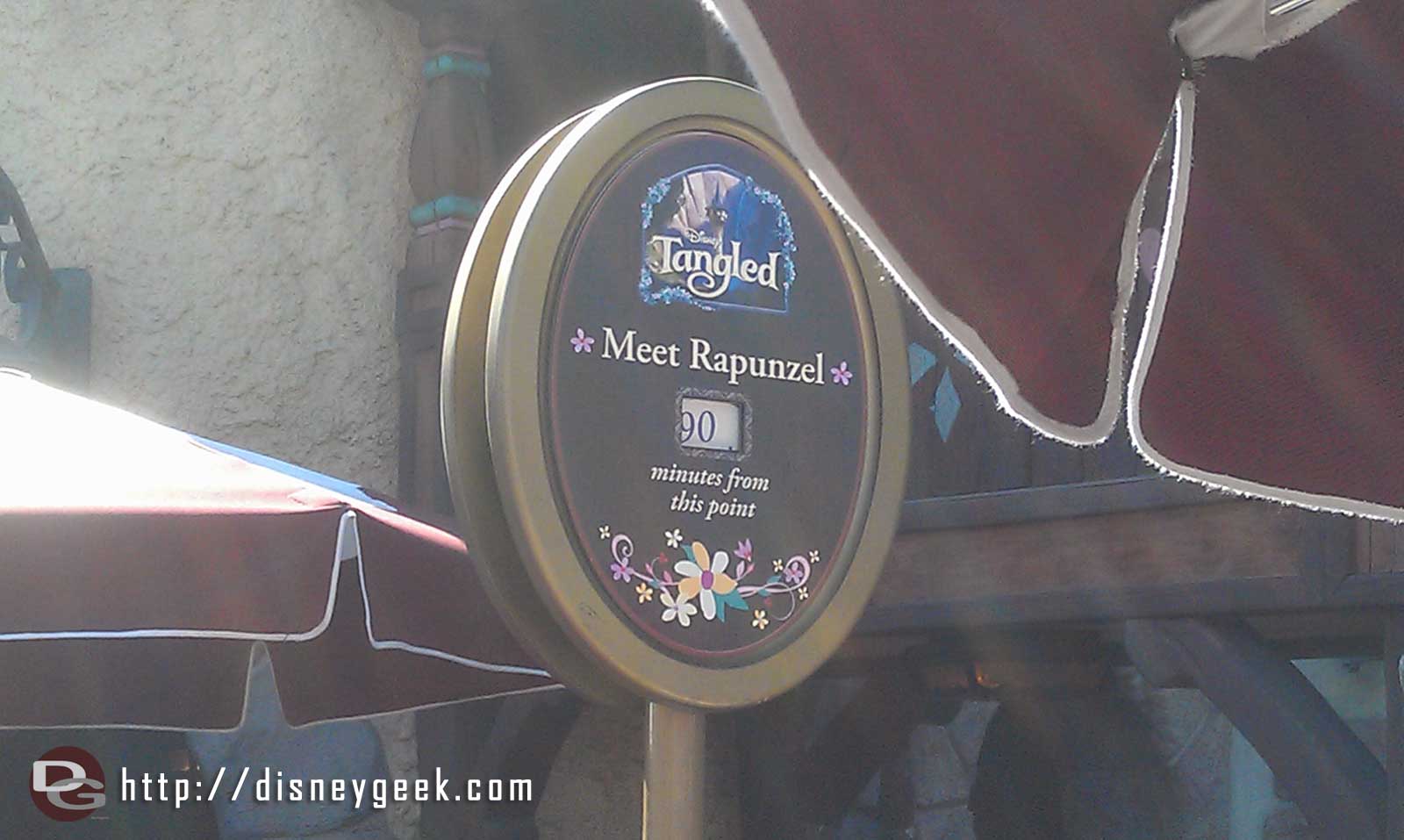 Fantasy Faire has not shortened the Rapunzel wait posted at 90 min