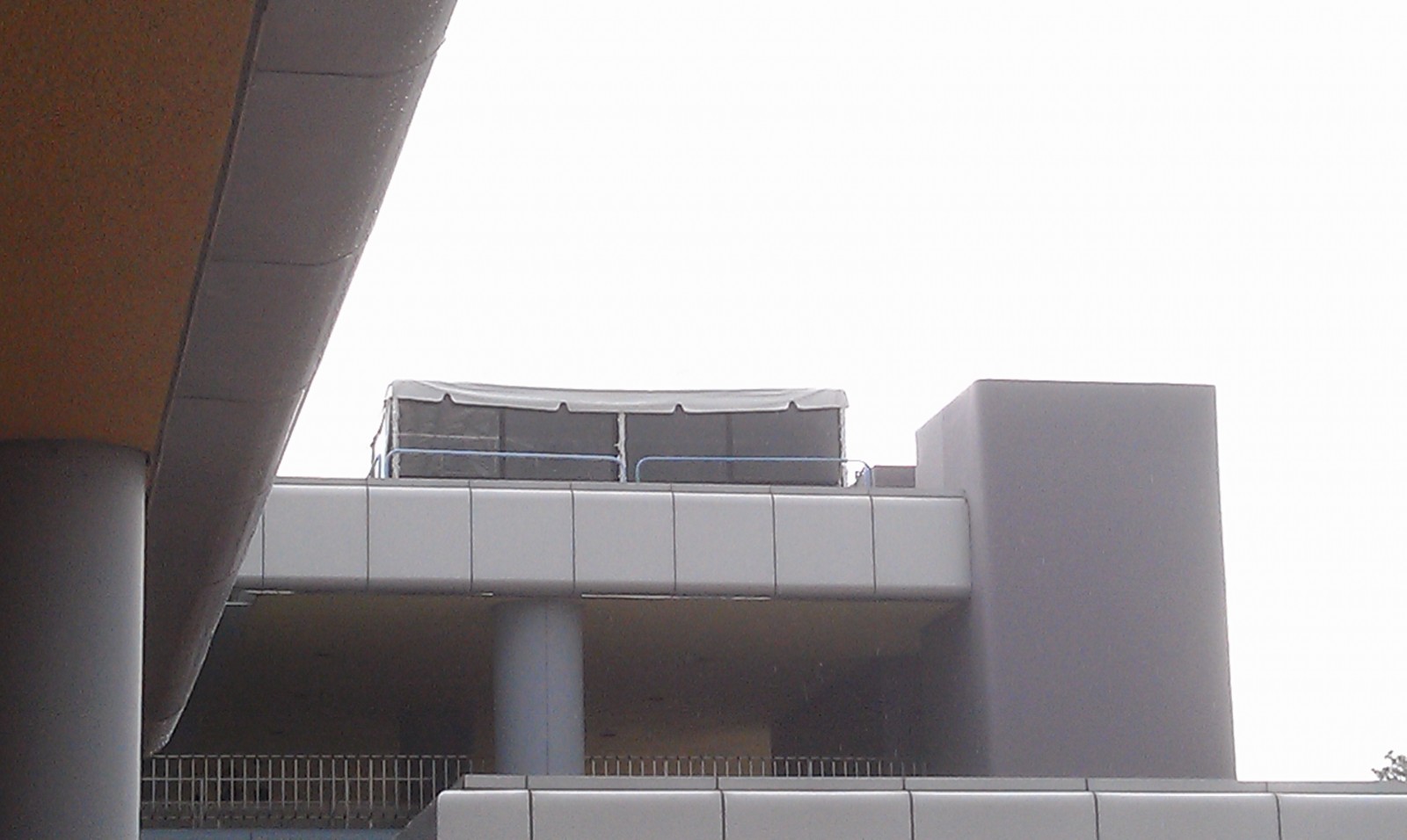 Anyone know what the tent housing projectors atop the Epcot Monorail station is for