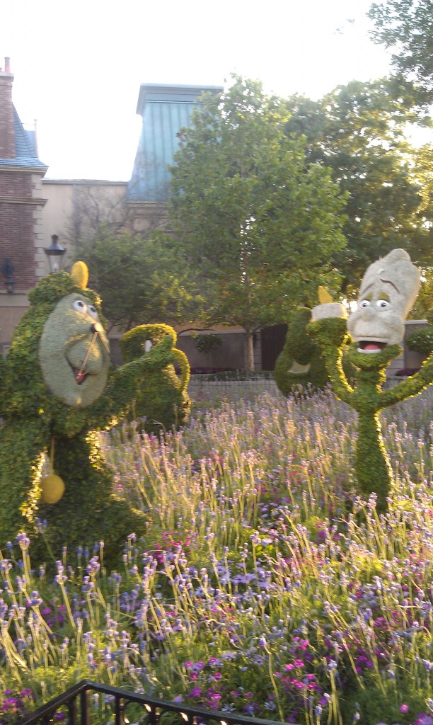 Cogsworth and Lumiere topiaries