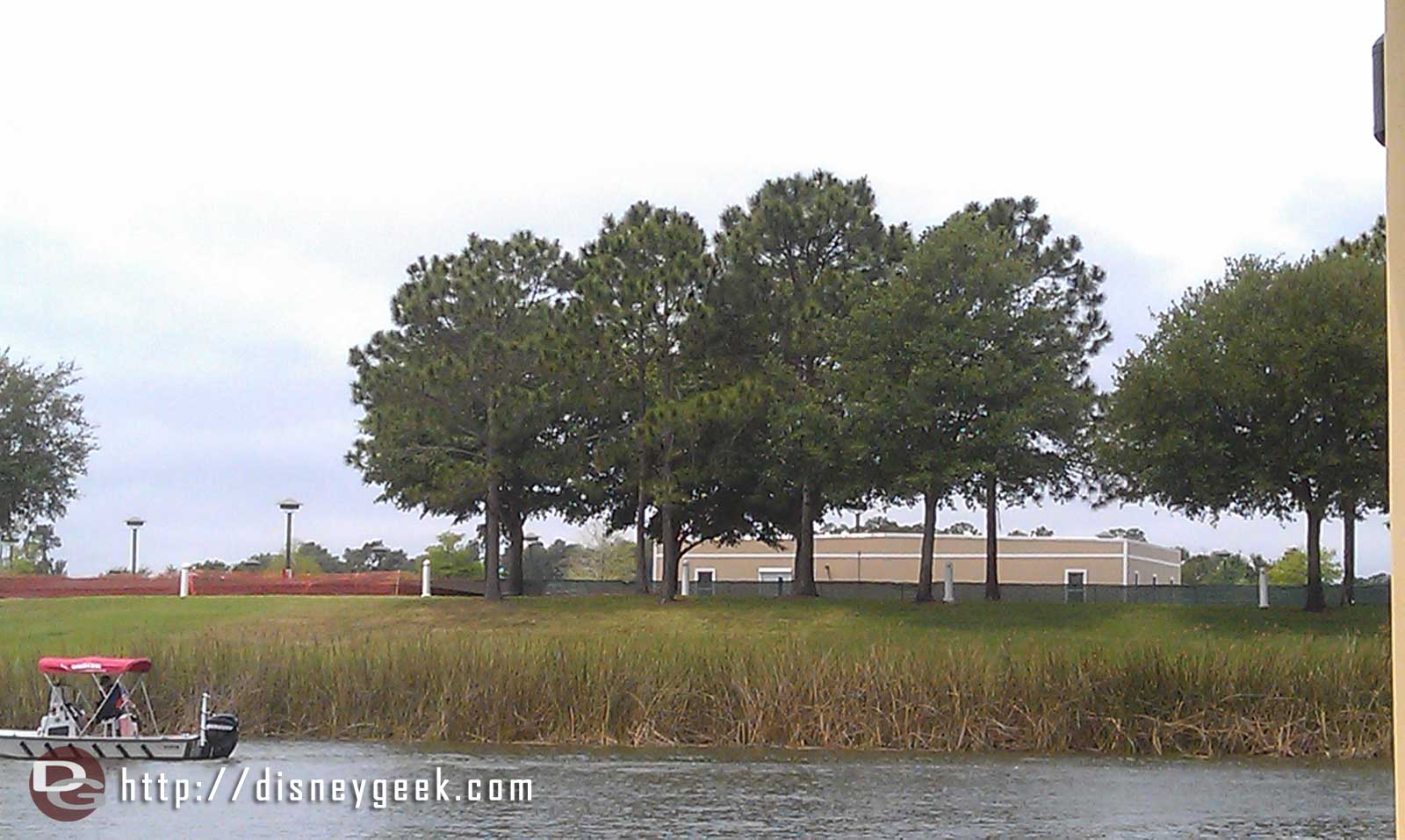 Construction trailors and fence on the far side of the West Side guessing for Disney Springs