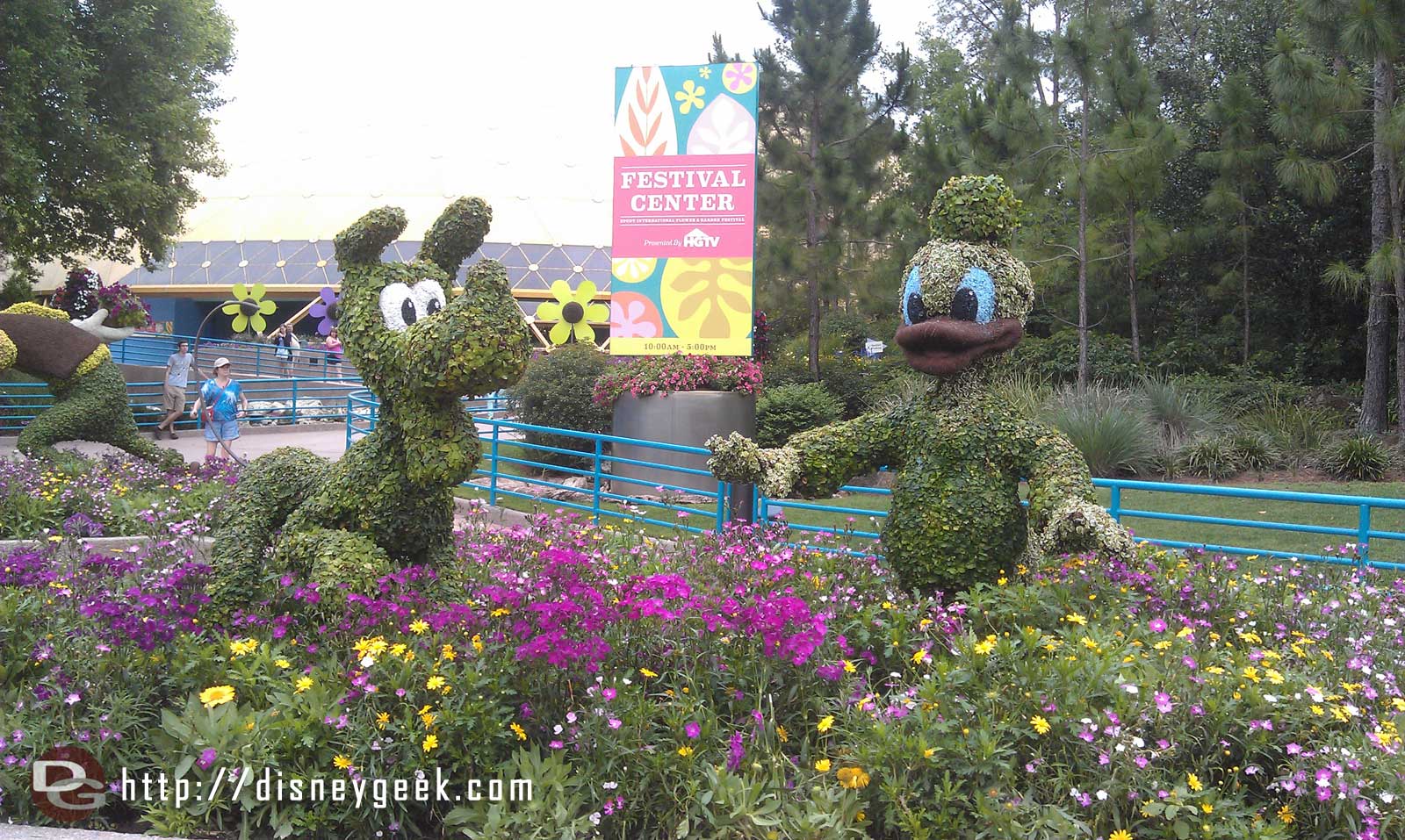 Donald and Pluto topiaries near the Festival Center