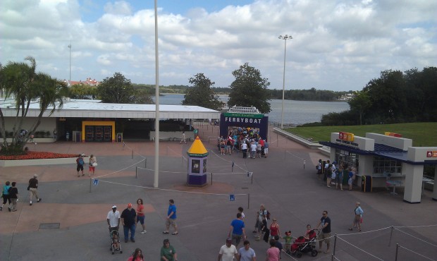 Looks like the Magic Kingdom may be crowded.  Ferry boat line to the sign and monorail down the ramp
