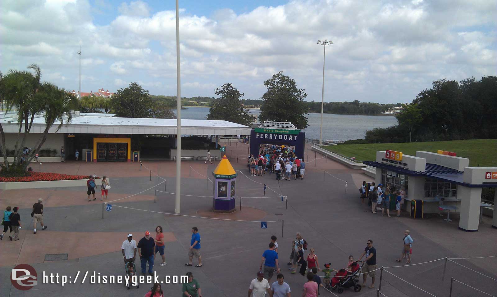 Looks like the Magic Kingdom may be crowded. Ferry boat line to the sign and monorail down the ramp