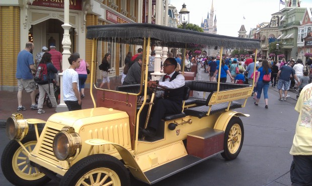 Main Street transportation, two cars and a trolley out