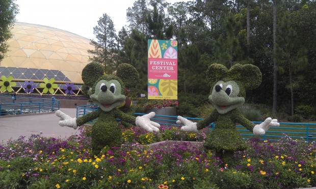 Mickey and Minnie topiaries in front of the Festival Center