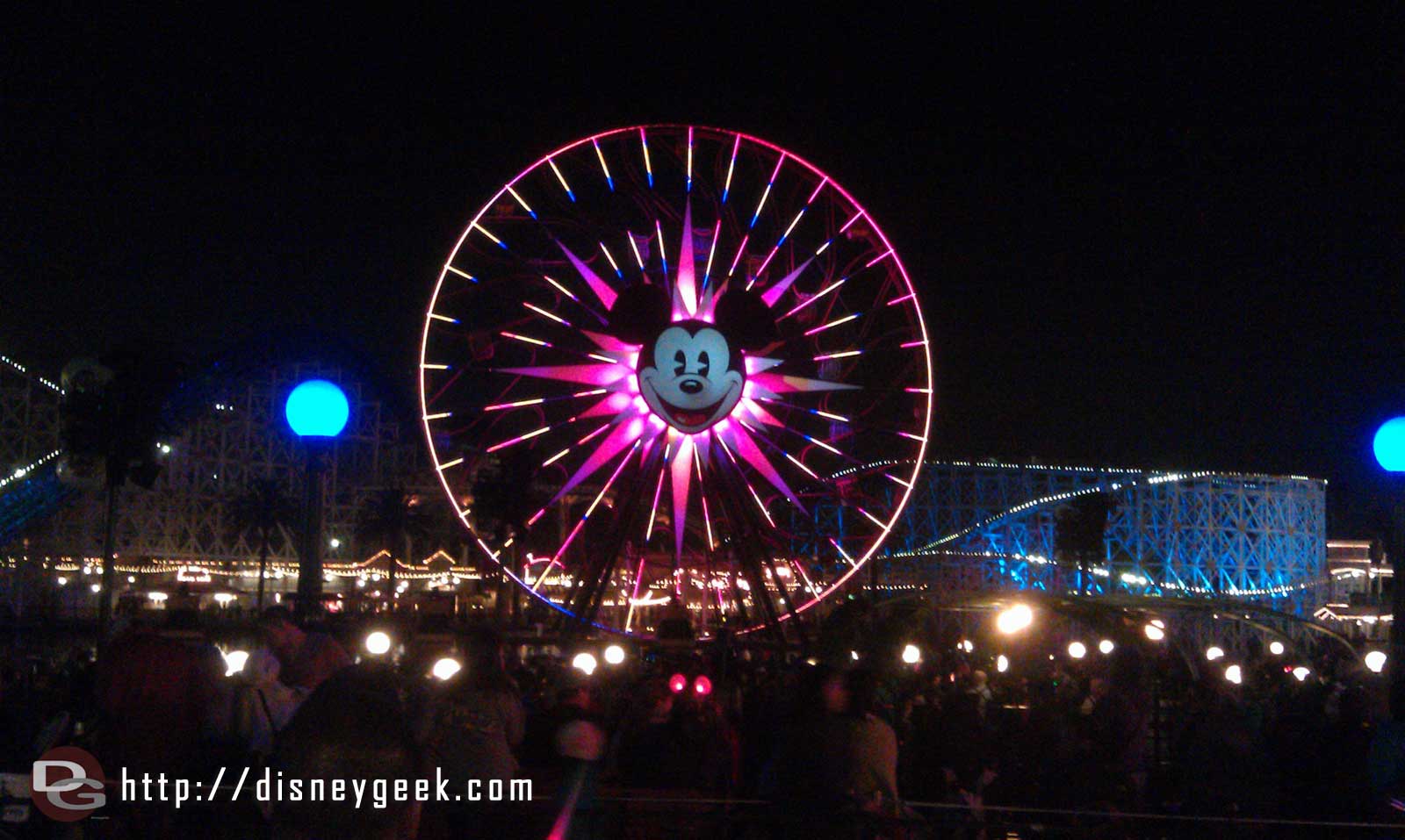 Waiting for World of Color Mickeys Fun Wheel across Paradise Bay