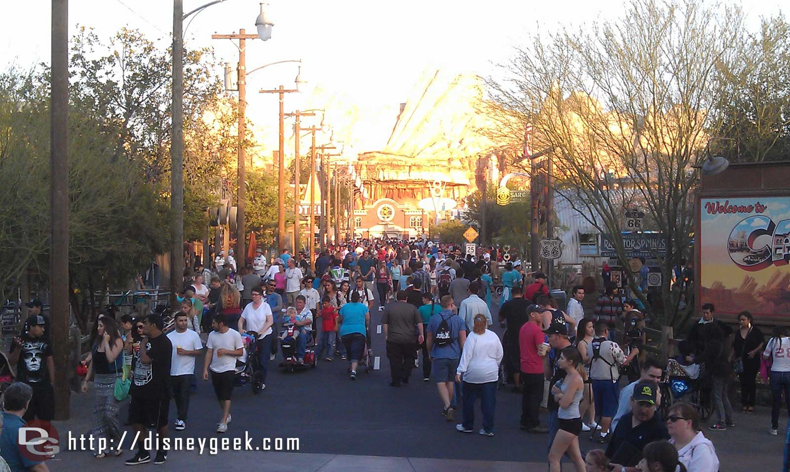 A look down Route 66 in CarsLand too bad all those people are in the way to see the new surface and lines