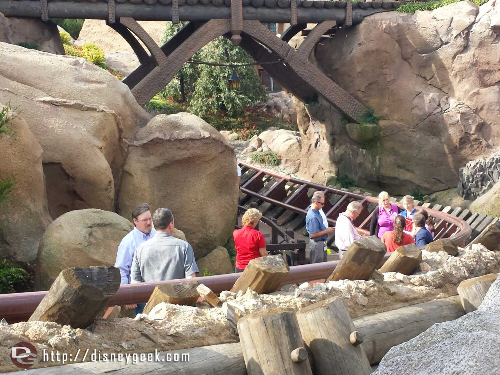 Looked to be a tour/inspection/punch list meeting going on with a large group of CMs, Imagineers and workers walking the track of the Seven Dwarfs Mine Train