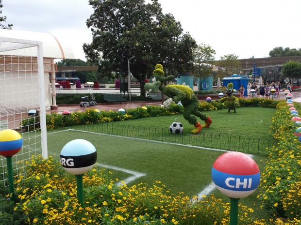 Goofy and Donald Topiaries playing soccer - Epcot