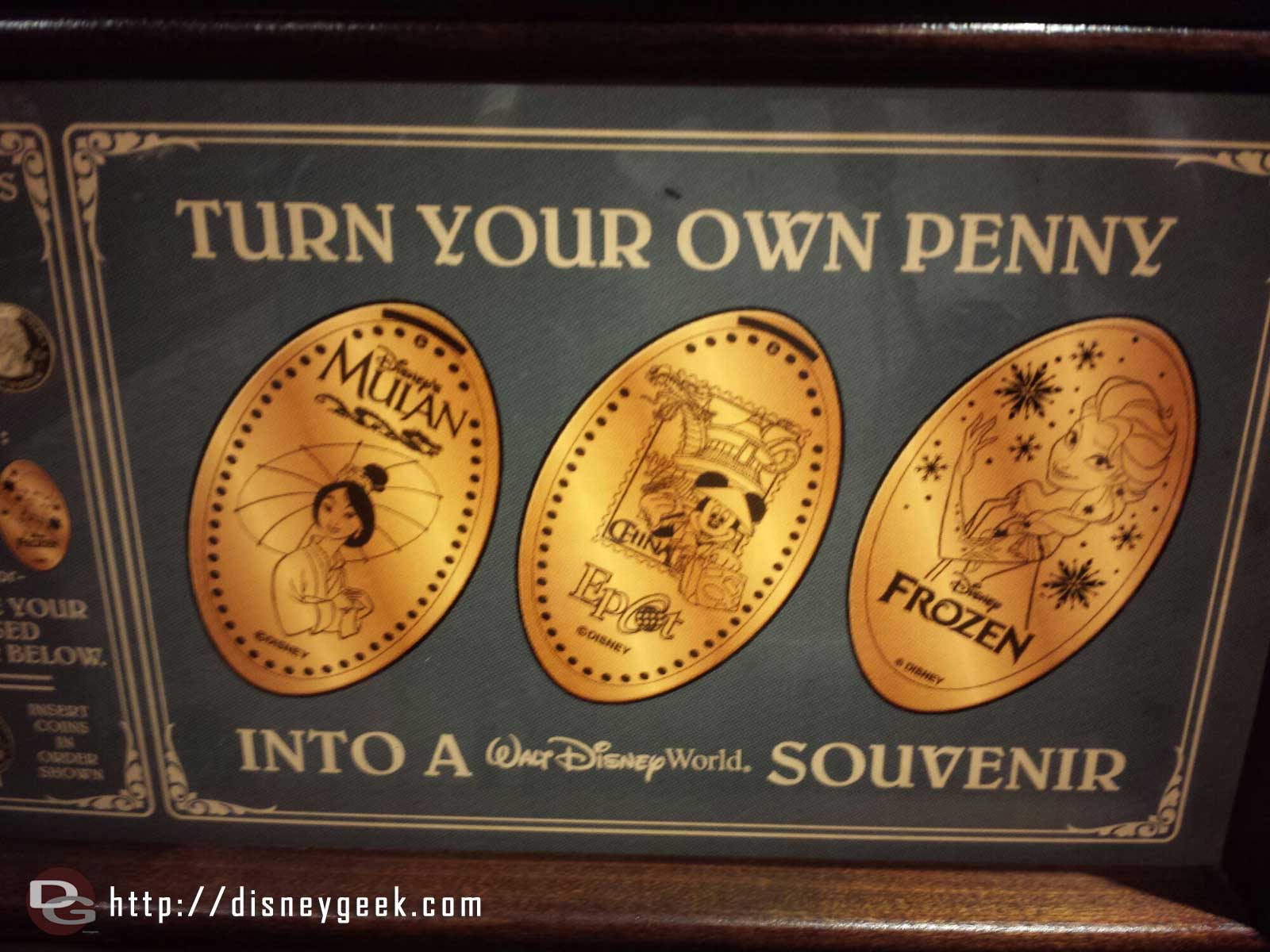 The pressed pennies at the International Gateway - Elsa, Mulan, and China