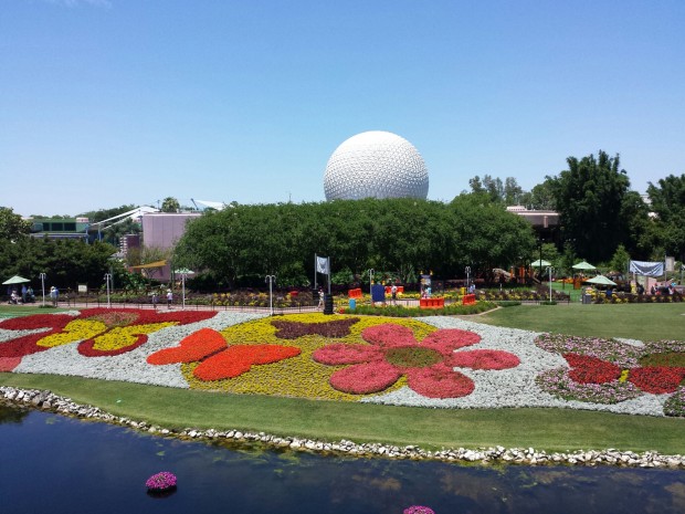 A look down at some of the large flower beds at the Epcot International Flower and Garden show from the monorail