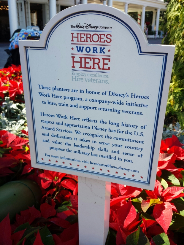 Heros Work Here sign in a planter at the American Adventure.