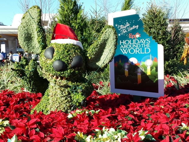 Stitch at the entrance/exit to Epcot celebrating Holidays Around the World.