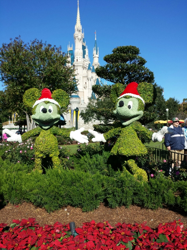 Mickey and Minnie topiaries dressed for the season.