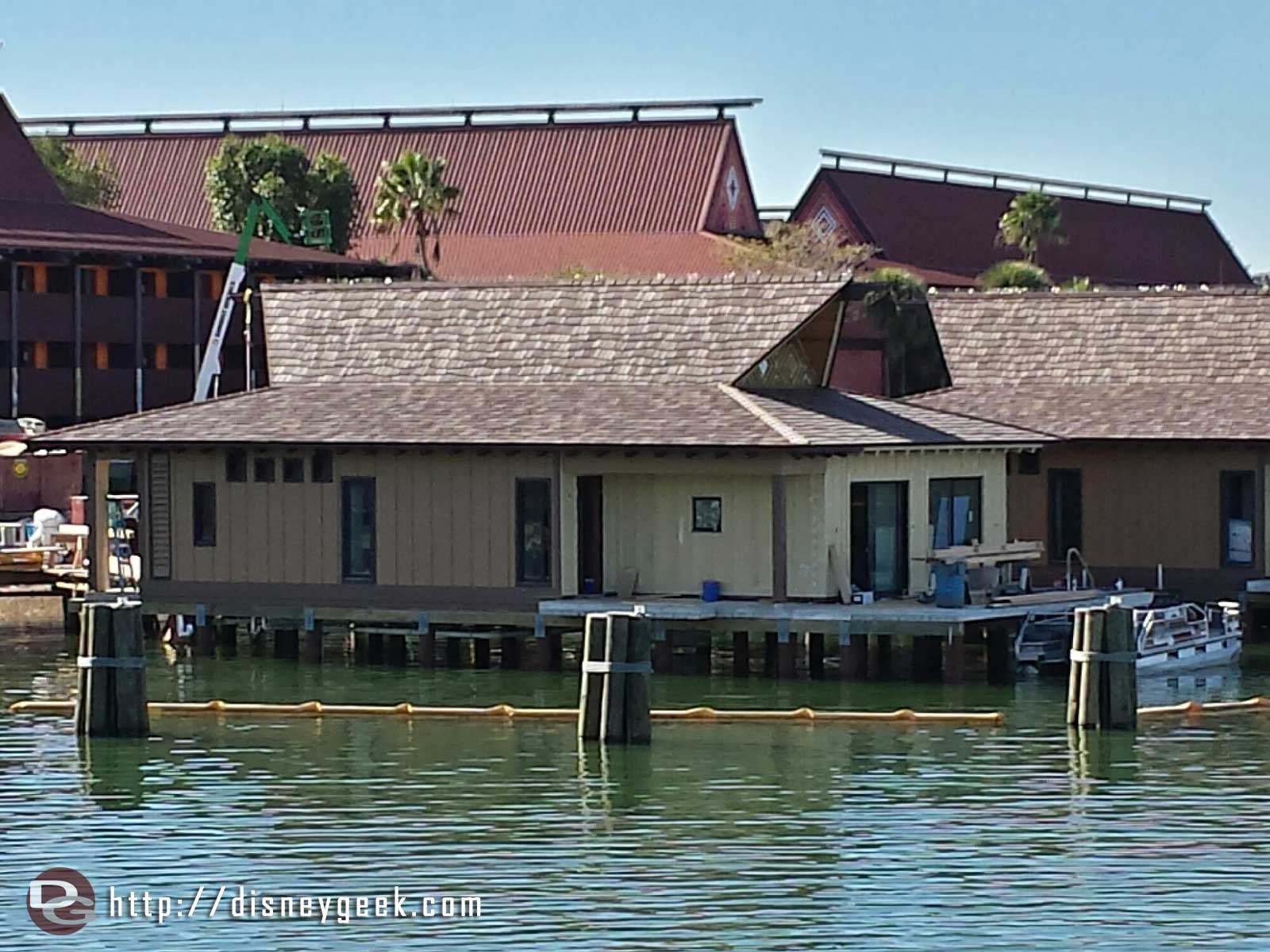 A Polynesian bungalow under construction, taken from the Magic Kingdom ferryboat.
