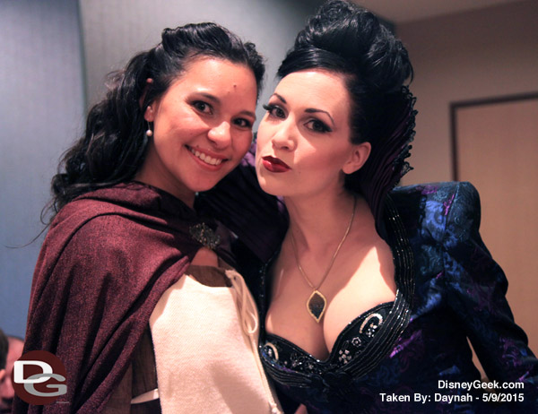 Marian and Evil Queen Cosplayers pose for a photo.