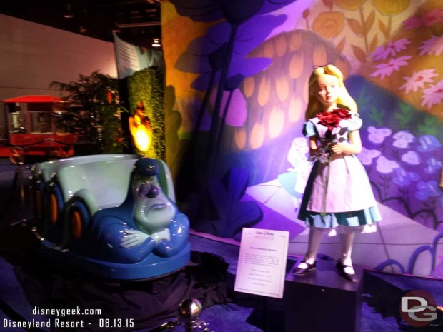 Alice in Wonderland figure and vehicle - Walt Disney Archives Presents - Disneyland: The Exhibit