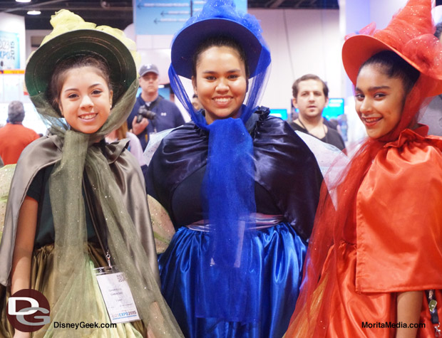 These cosplayers dressed as Flora, Fauna and Merryweather (aka the Three Good Fairies) are the Good Fairy Godmothers from Sleeping Beauty