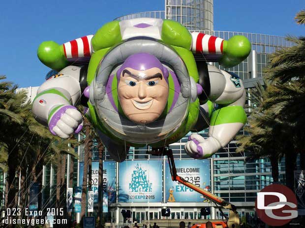 Buzz Lightyear greets you as you arrive