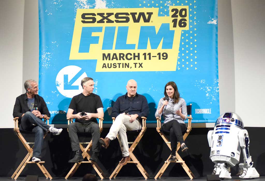 AUSTIN, TX - MARCH 14:  Moderator Scott Mantz, Supervising Sound Editor Matt Wood, VFX Supervisor Roger Guyett, co-producer Michelle Rejwan and R2D2 speak during the Q&A after a screening of Star Wars: The Force Awakens: A Cinematic Journey on March 14, 2016 in Austin, Texas.  (Photo by Vivien Killilea/Getty Images for Walt Disney Studios Home Entertainment) *** Local Caption *** Scott Mantz; Matt Wood; Roger Guyett; Michelle Rejwan; R2D2