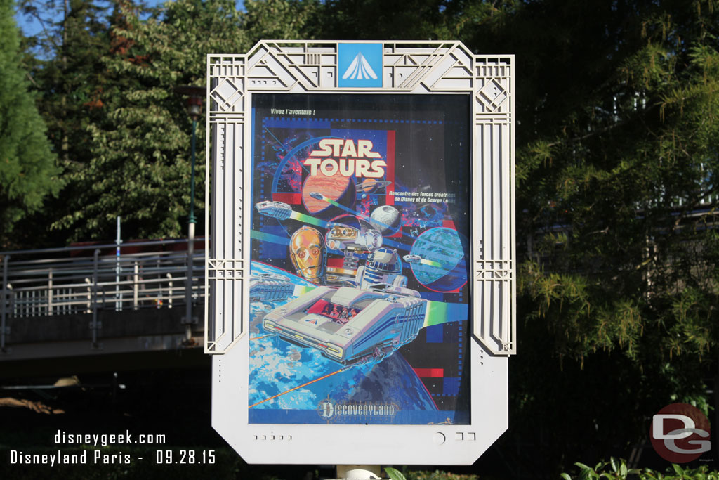 Disneyland Paris - Star Tours Attraction Poster hanging in the outdoor queue area.
