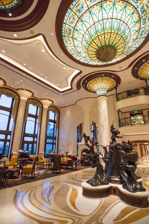 The rich details of the lobby of the Shanghai Disneyland Hotel highlight the grandeur of this Art Nouveau hotel.