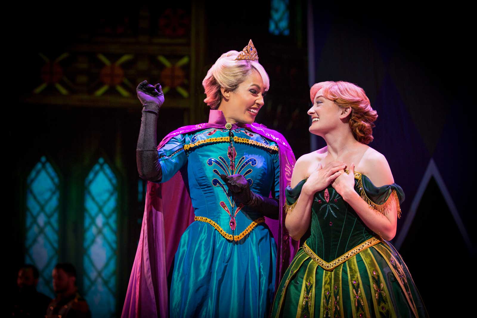 ANNA AND ELSA IN 'FROZEN - LIVE AT THE HYPERION' -- A new theatrical interpretation for the stage based on Disney's animated blockbuster film, Frozen is now playing at the Hyperion Theater at Disney California Adventure Park. The show immerses audiences in the emotional journey of Anna and Elsa with all of the excitement of live theater, including elaborate costumes and sets, stunning special effects and show-stopping production numbers.(Piotr A. Redlinski/Disneyland Resort)