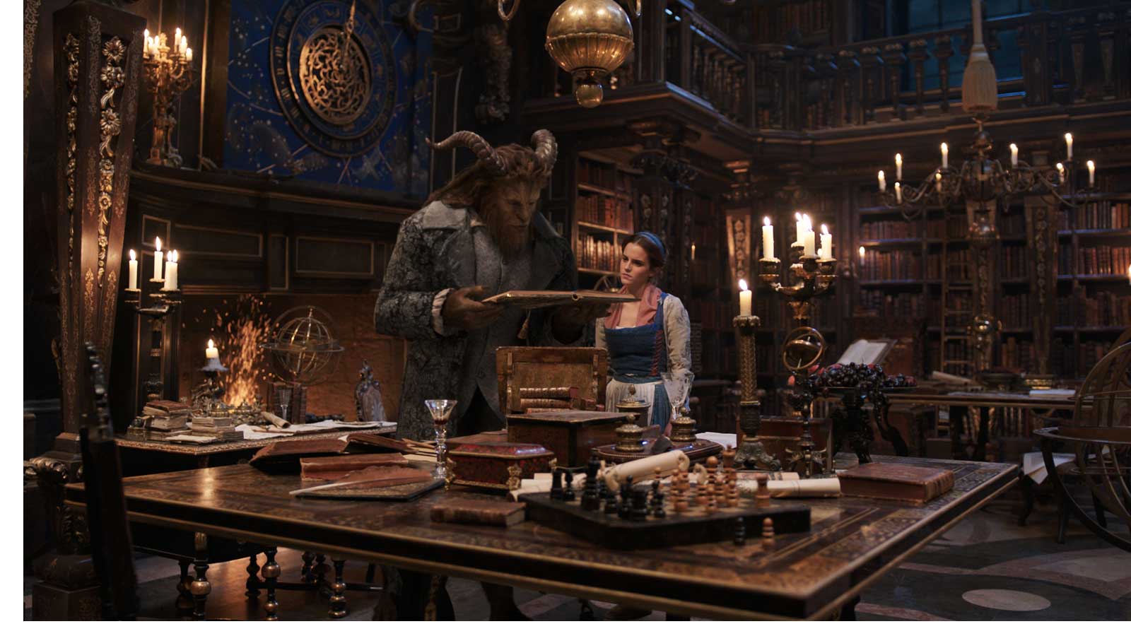 The Beast (Dan Stevens) and Belle (Emma Watson) in the castle library in Disney's BEAUTY AND THE BEAST, a live-action adaptation of the studio's animated classic which is a celebration of one of the most beloved stories ever told.