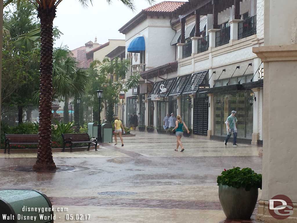 It let up slightly and guests made a run for it.  Very little cover in Disney Springs to walk between stores.