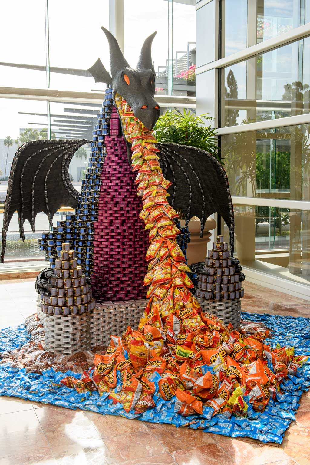 The Disneyland Resort Design and Engineering team brought the Maleficent dragon from the popular nighttime spectacular “Fantasmic!” to life by creating a 10-foot character overnight from 5,250 canned goods at the 10th anniversary of CANstruction Orange County.