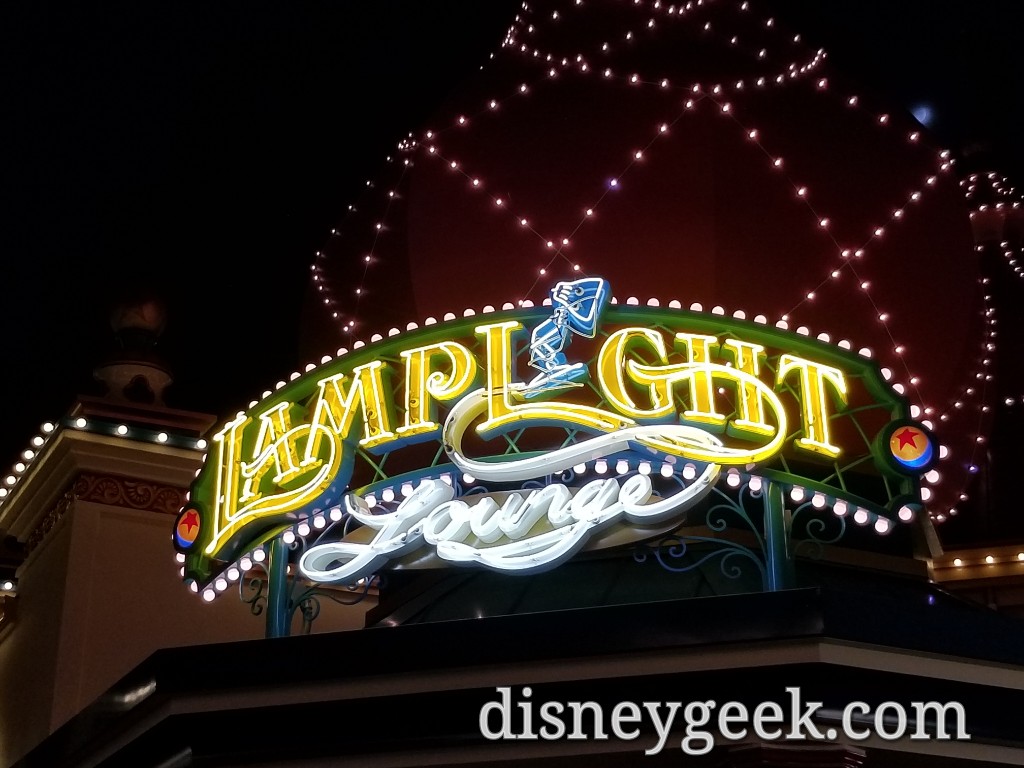 The Lamp Light Lounge Neon Sign looks complete and functional on Pixar ...