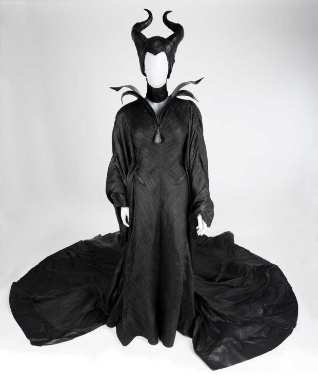 Maleficent - costume, black "Christening" dress, black collar, black corset, black boots, black headdress w/ horns, black spine ring (08456). Change #2, Sc: 88-89