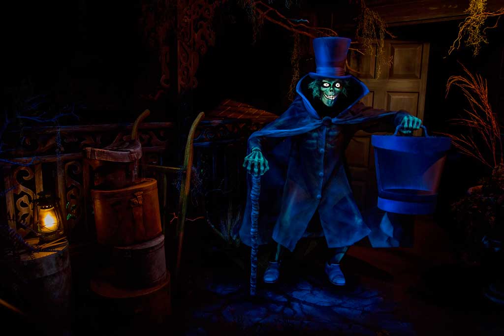 The Hatbox Ghost looms over guests as they enter the cemetery in their doom-buggy in the Haunted Mansion at Disneyland Park. The Haunted Mansion is the home of 999 happy haunts, but there is “always room for one more.” The Haunted Mansion at Disneyland Park in Anaheim, Calif., opened on Aug. 9, 1969. (Paul Hiffmeyer/Disneyland Resort)