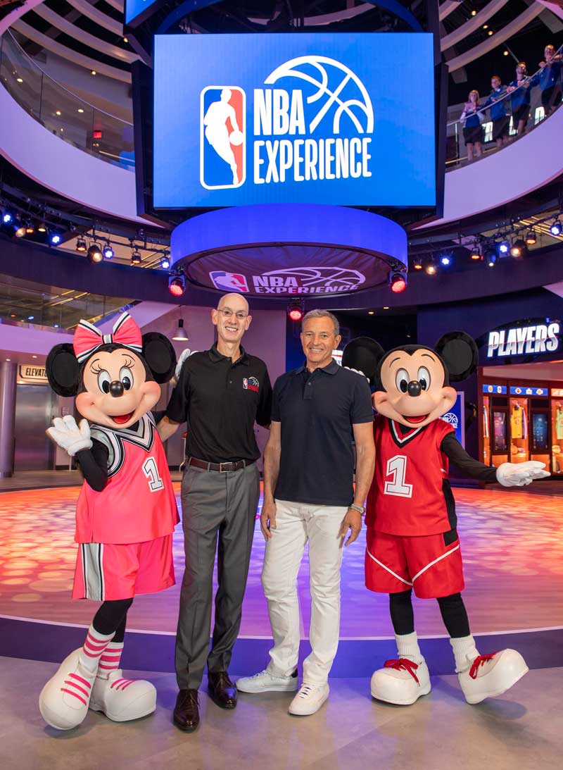 Disney Chairman and CEO Bob Iger (center right) and NBA Commissioner Adam Silver (center left) celebrate the grand opening of NBA Experience at Disney Springs, Aug. 12, 2019, at Walt Disney World Resort in Lake Buena Vista, Fla. The first-of-its-kind destination invites fans of all ages to enter the world of professional basketball in an immersive, interactive venue celebrating the NBA and WNBA. (David Roark, photographer)